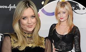 How tall is Laura Whitmore?